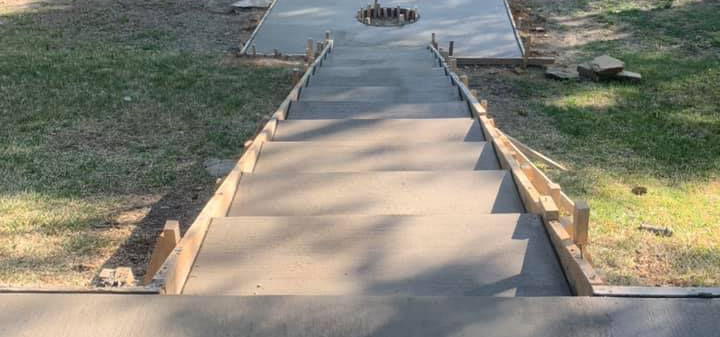 Freshly finished concrete steps and walkway by GL Concrete Solutions