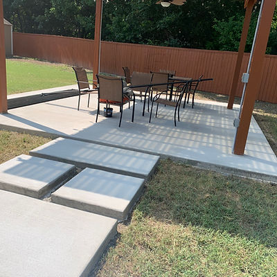 Completed patio and geometric walkway by GL Concrete Solutions