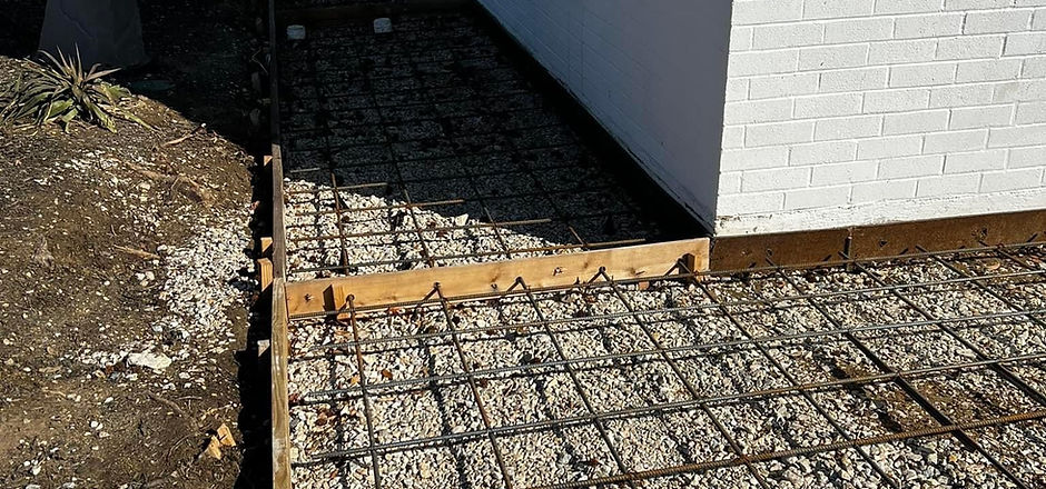 Rebar and concrete forms around a building corner