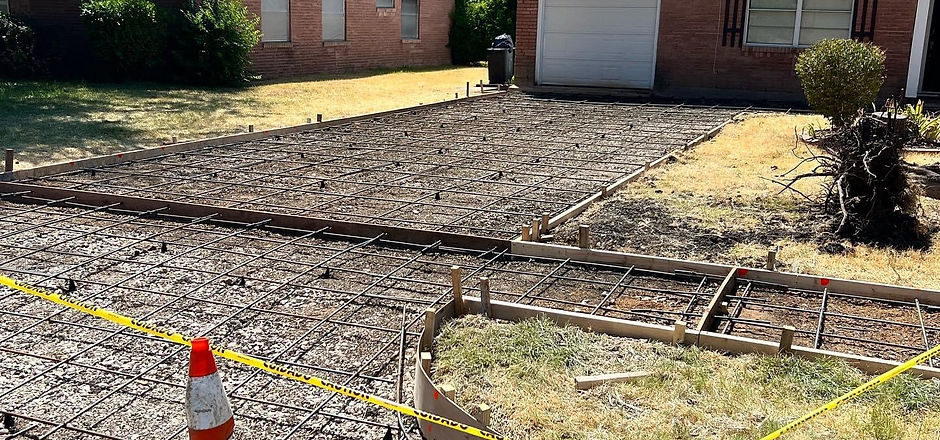 Driveway reinforcement and forms before concrete placement