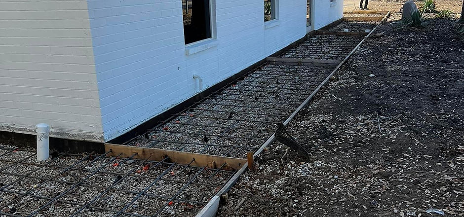 Form and reinforcement preparation for a side walkway
